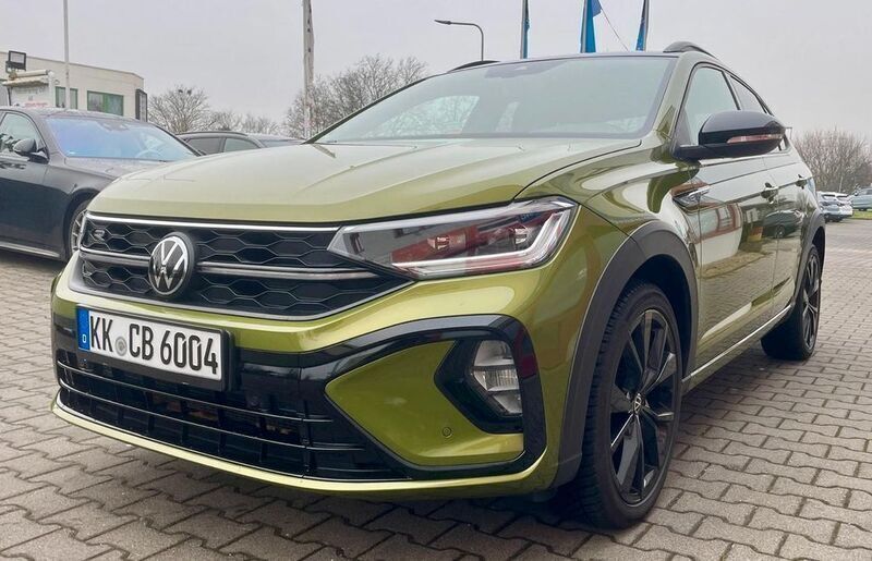Visual green metallic Gebraucht 2023 VW Taigo R-line SUV | 23.790 € (Teuer) - Bild 1/4