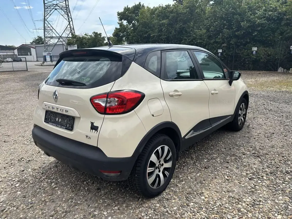 Gebraucht Renault Captur Experience 90 PS (66 kW) 2016 Elfenbein d16 + schwarz gne SUV