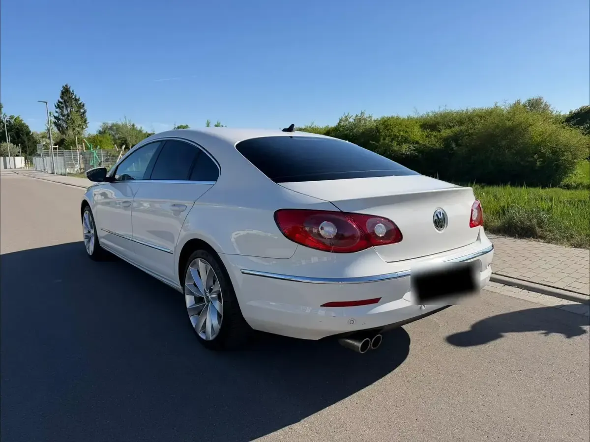 Używany VW Passat Exclusive 170 KM (125 kW) 2011 Biały Coupe