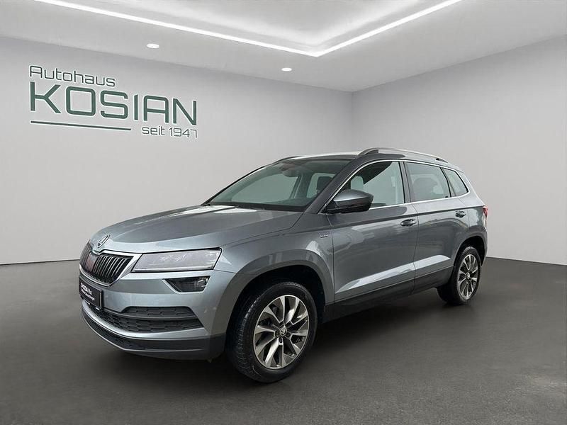 Grau Gebraucht 2021 Skoda Karoq Ambition SUV | 24.890 € (Fairer Preis) - Bild 1/4
