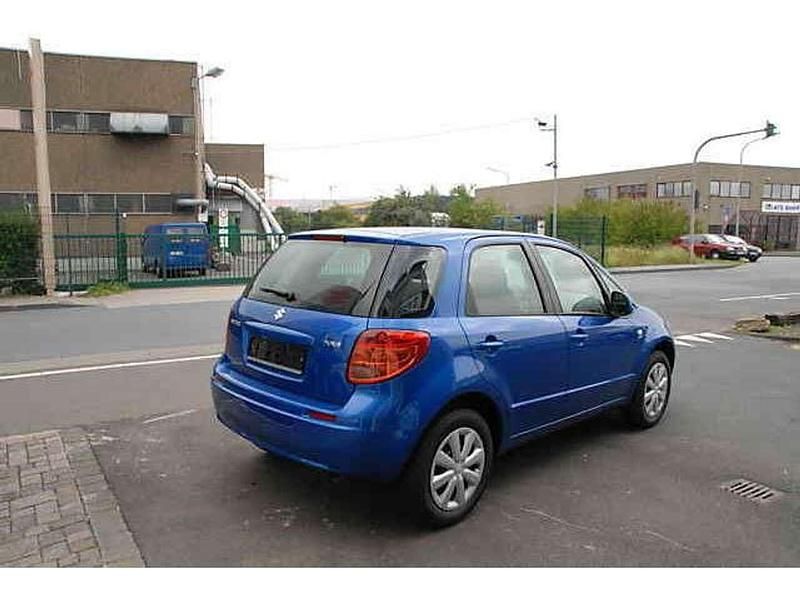 Blau Gebraucht 2008 Suzuki SX4 Club Limousine | 7.990 € - Bild 1/2