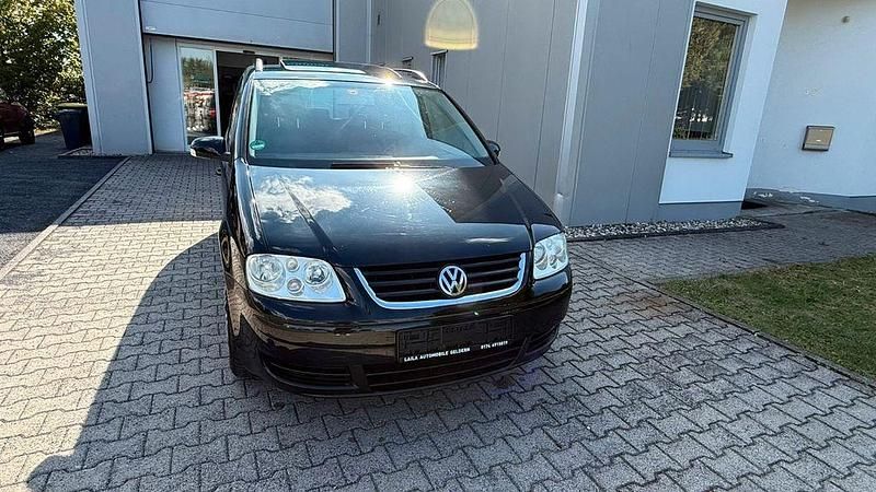 Schwarz Gebraucht 2005 VW Touran Conceptline Van / Kleinbus | 3.999 € (Etwas zu teuer) - Bild 1/4
