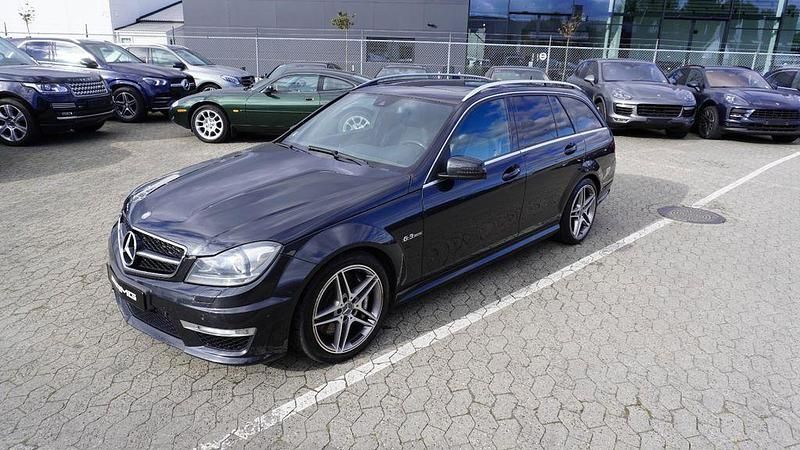 Schwarz Gebraucht 2012 Mercedes C63 AMG AMG line Limousine | 24.700 € (Fairer Preis) - Bild 1/4