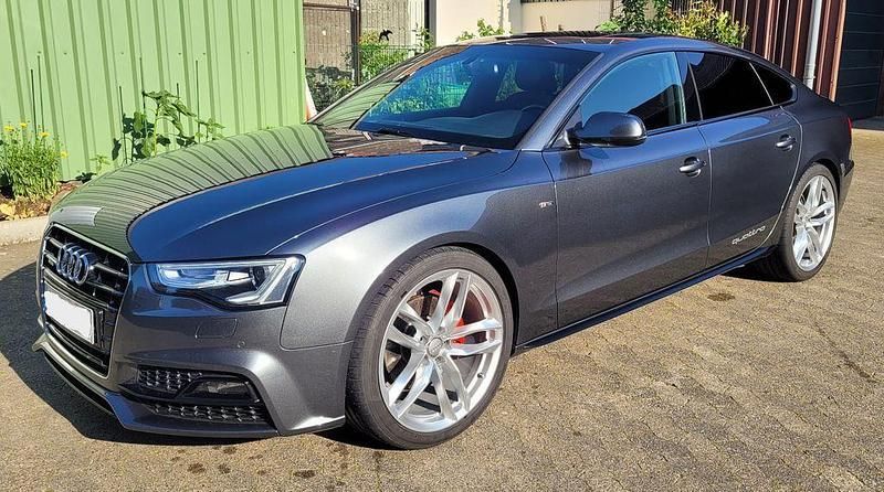 Grau Gebraucht 2015 Audi A5 Sportback S-Line Limousine | 18.490 € (Guter Preis) - Bild 1/4