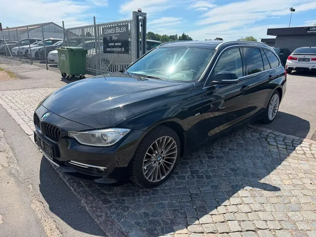 Gebraucht BMW 320 Sport Line 184 PS (135 kW) 2013 Schwarz Kombi