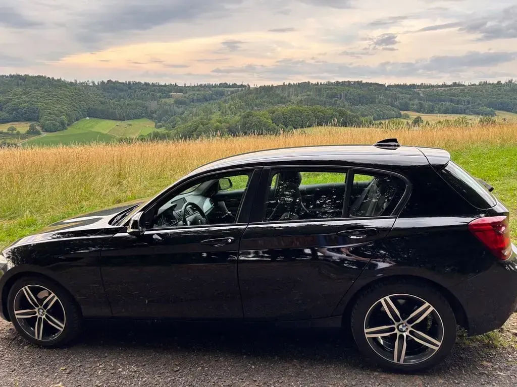 Używany BMW 116 136 KM (100 kW) 2011 Czarny Hatchback