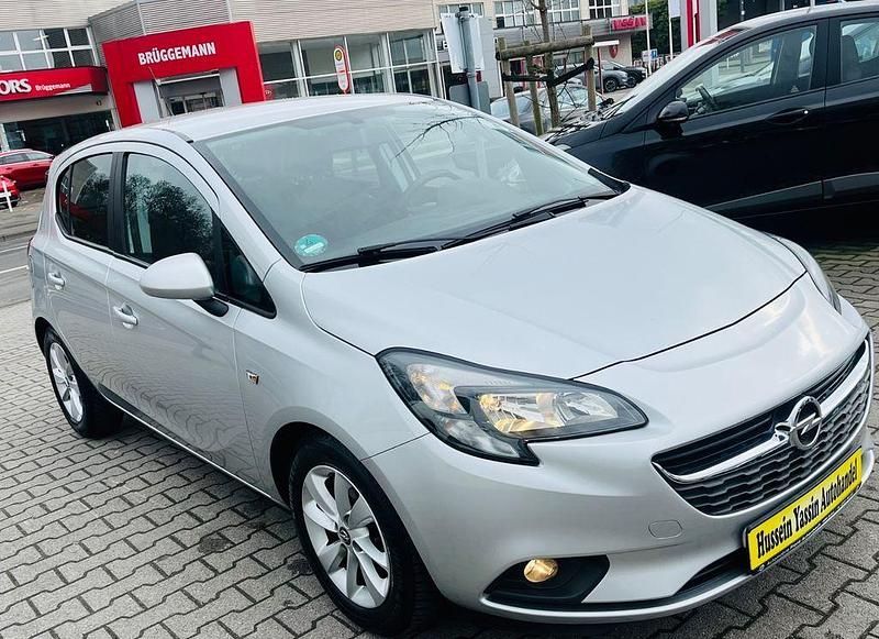 Gebraucht Opel Corsa drive 90 PS (66 kW) 2015 Silber Kleinwagen