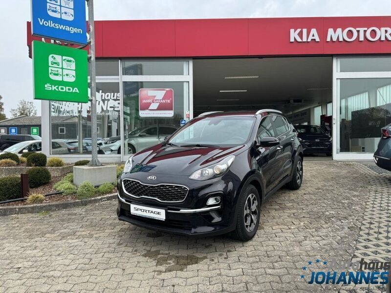 Zelinaschwarz Gebraucht 2019 Kia Sportage DREAM-TEAM Edition SUV | 15.990 € (Guter Preis) - Bild 1/4