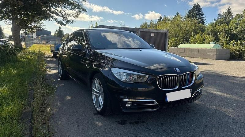 Schwarz Gebraucht 2014 BMW 520 Gran Turismo Luxury Line Limousine | 12.000 € (Fairer Preis) - Bild 1/4