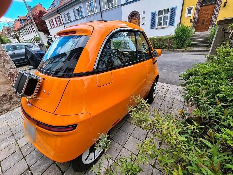 Second-hand Micro Microlino 12 kW (17 CP) 2023 Portocaliu Hatchback