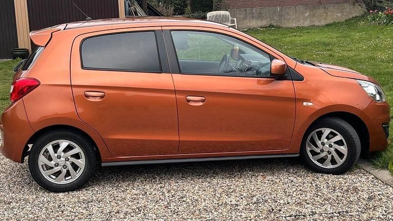 Second-hand Mitsubishi Space Star Edition+ 80 CP (58 kW) 2016 Portocaliu Hatchback