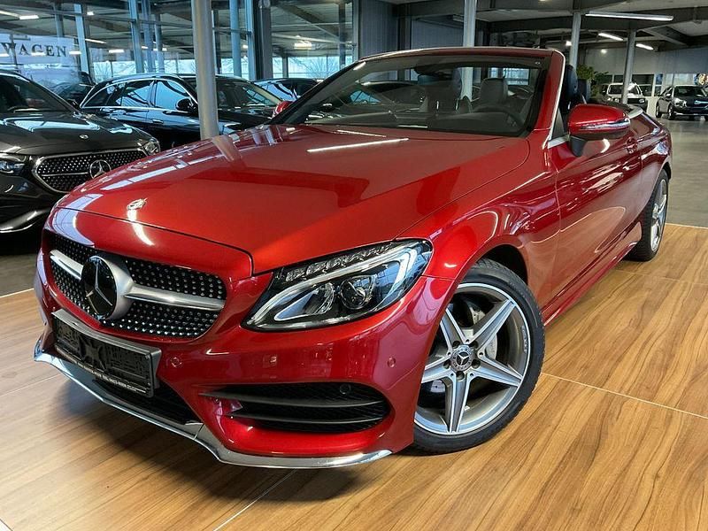 Hyazinthrot metalliclack Gebraucht 2018 Mercedes C180 AMG line Cabrio | 27.499 € (Fairer Preis) - Bild 1/4