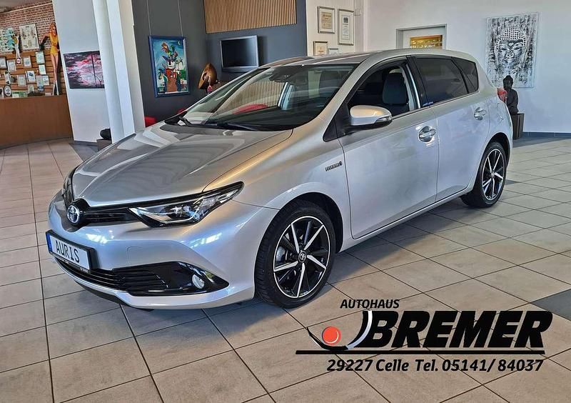 Platinsilber Gebraucht 2019 Toyota Auris Hybrid Edition-S Limousine | 15.950 € (Fairer Preis) - Bild 1/4