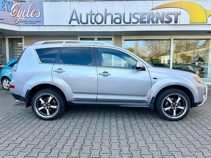 Silber Gebraucht 2009 Mitsubishi Outlander Invite SUV | 7.999 € (Fairer Preis) - Bild 1/4