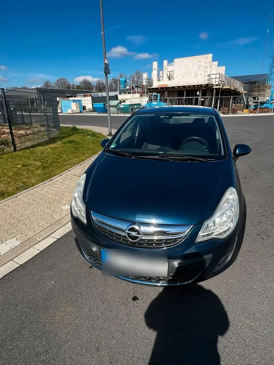 Gebraucht Opel Corsa Active 87 PS (63 kW) 2013 Blau Kleinwagen