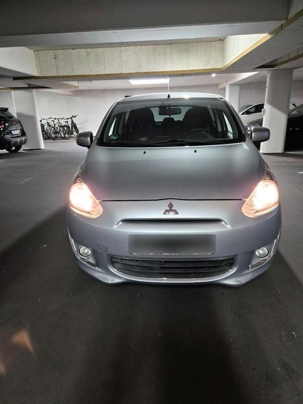 Grau Gebraucht 2013 Mitsubishi Space Star Kleinwagen | 2.950 € (Fairer Preis) - Bild 1/4