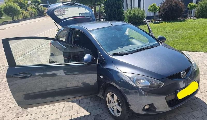 Grau Gebraucht 2008 Mazda 2 Inclusive Limousine | 1.849 € (Guter Preis) - Bild 1/4