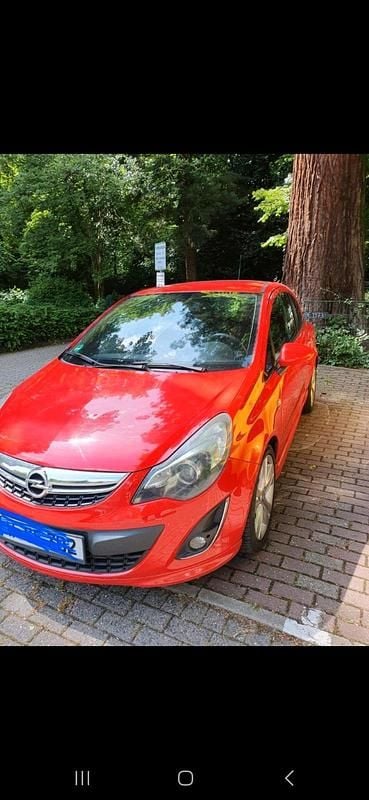Rot Gebraucht 2014 Opel Corsa Sport Kleinwagen | 4.199 € (Fairer Preis) - Bild 1/4
