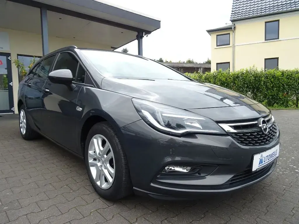 Używany Opel Astra Edition 125 KM (91 kW) 2016 Szary Kombi