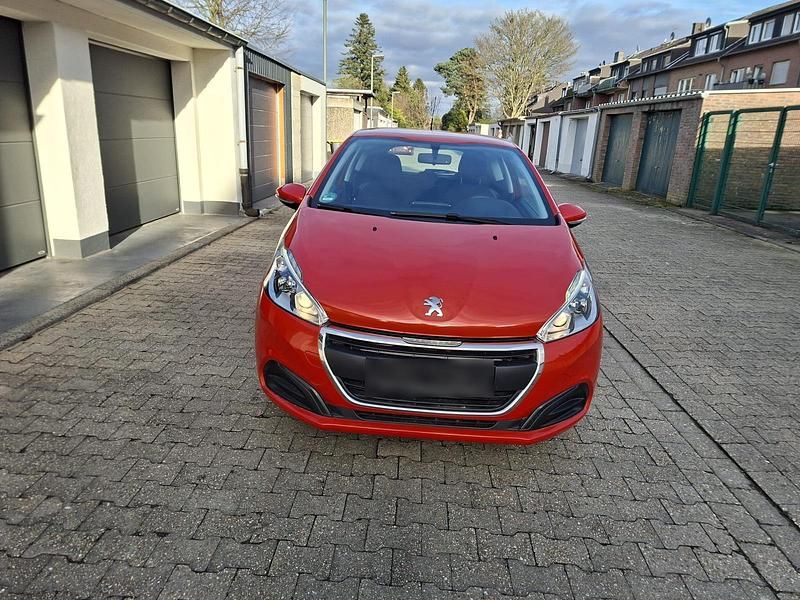 Gebraucht Peugeot 208 85 PS (62 kW) 2016 Orange Kleinwagen