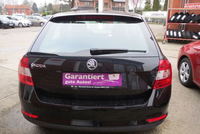 Gebraucht Skoda Rapid Ambition 90 PS (66 kW) 2014 Schwarz metallic Kombi