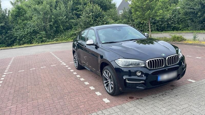Schwarz Gebraucht 2015 BMW X6 M50 SUV | 32.900 € (Fairer Preis) - Bild 1/4