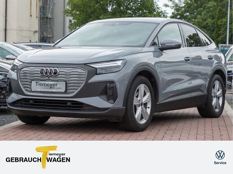 Grau Gebraucht 2022 Audi Q4 Sportback e-tron Design SUV | 29.980 € (Fairer Preis) - Bild 1/4