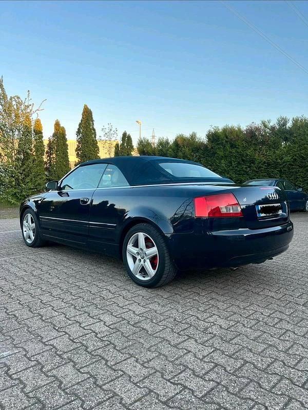 Second-hand Audi A4 163 CP (119 kW) 2004 Albastru Cabrio