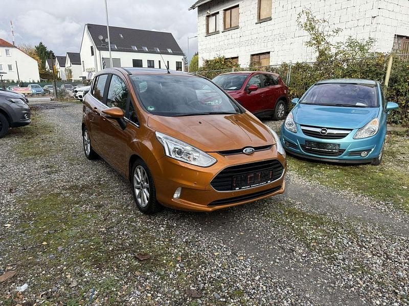 Orange Gebraucht 2016 Ford B-MAX Titanium Van / Kleinbus | 6.599 € (Fairer Preis) - Bild 1/4
