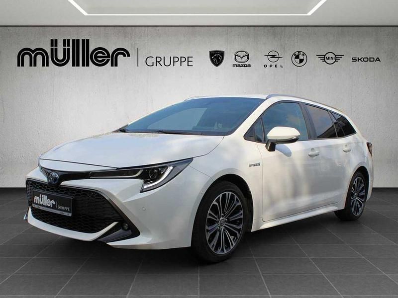 Weiß Gebraucht 2021 Toyota Corolla Team Kombi | 22.490 € (Guter Preis) - Bild 1/4