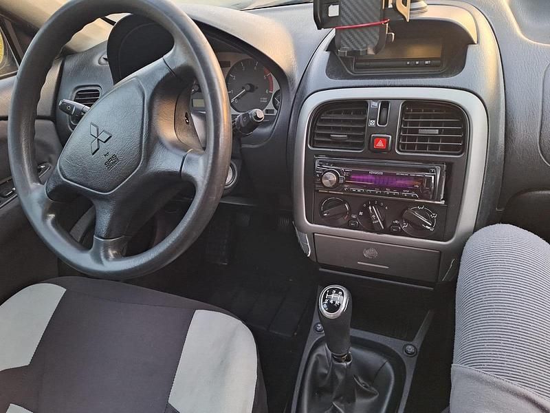 Gebraucht Mitsubishi Carisma 102 PS (75 kW) 2002 Blau Limousine