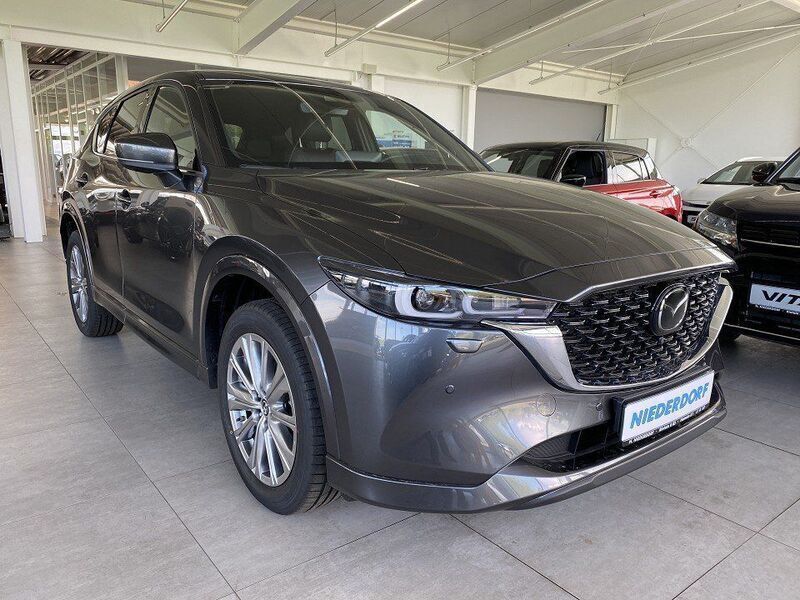 Machine grey Gebraucht 2024 Mazda CX-5 Takumi-Line SUV | 37.500 € (Fairer Preis) - Bild 1/4