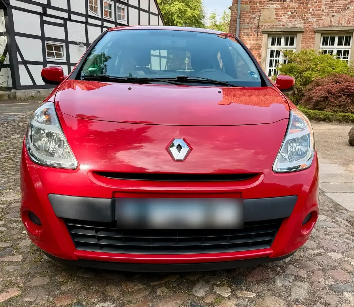 Używany Renault Clio II 75 KM (55 kW) 2010 Czerwony Hatchback