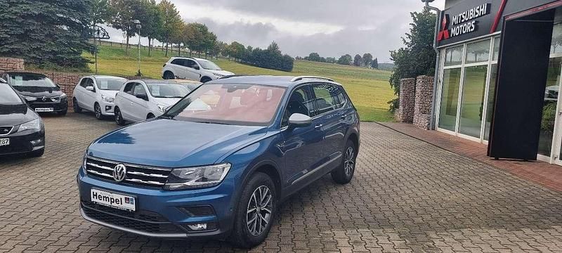 Grün Gebraucht 2021 VW Tiguan Comfortline SUV | 32.990 € (Fairer Preis) - Bild 1/4