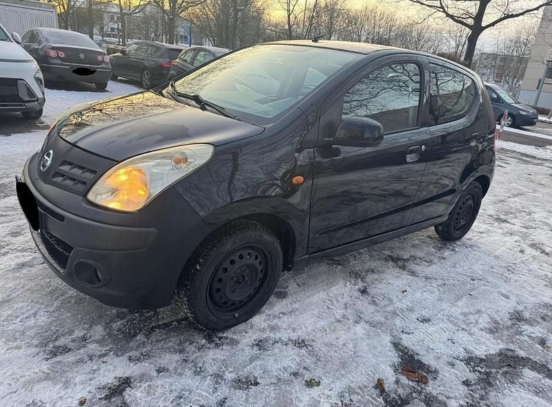 Gebraucht Nissan Pixo 68 PS (50 kW) 2011 Schwarz Kleinwagen