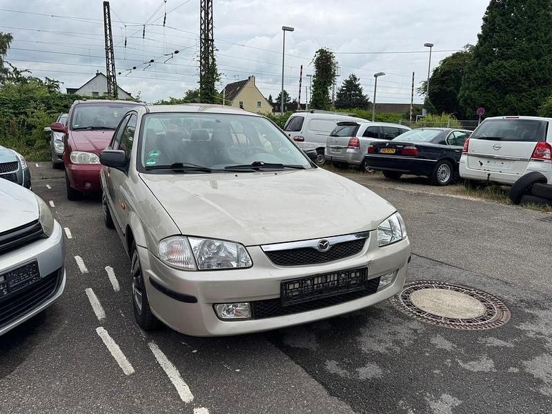 Grau Gebraucht 1999 Mazda 323F Exclusive Limousine | 1.800 € (Fairer Preis) - Bild 1/4