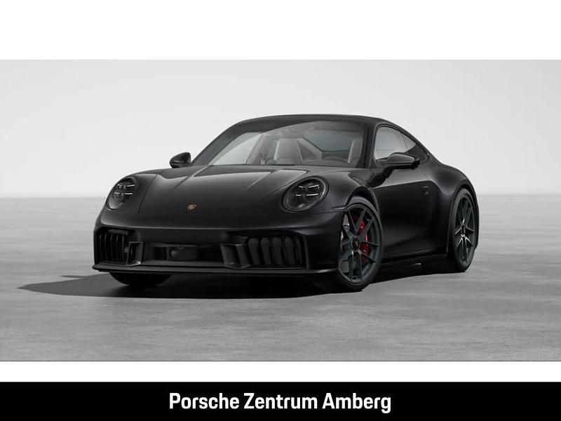 Tiefschwarzmetallic Gebraucht 2024 Porsche 911 Carrera 4 GTS Coupé | 189.990 € - Bild 1/4