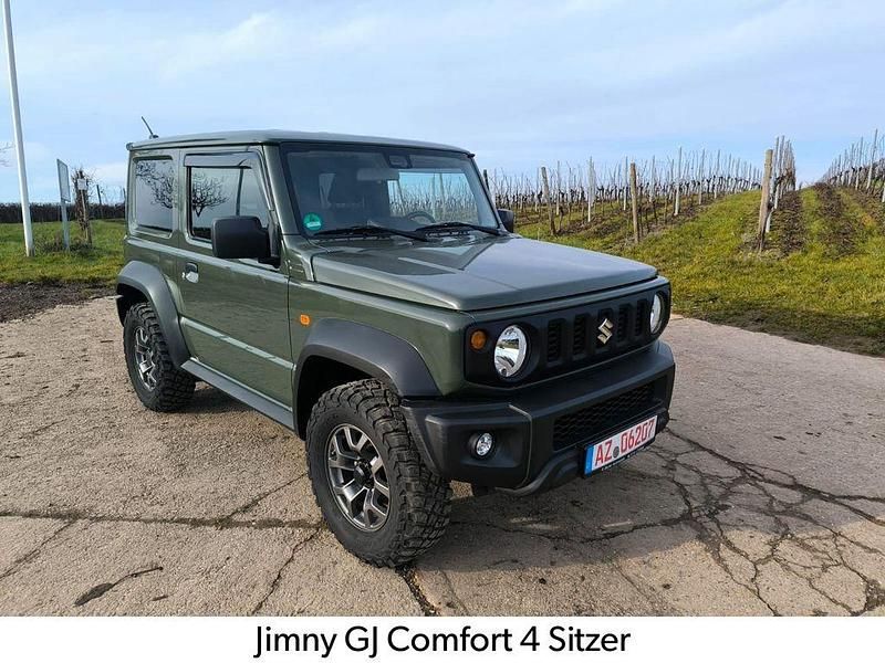 Grün Gebraucht 2019 Suzuki Jimny Comfort SUV | 29.990 € (Fairer Preis) - Bild 1/4