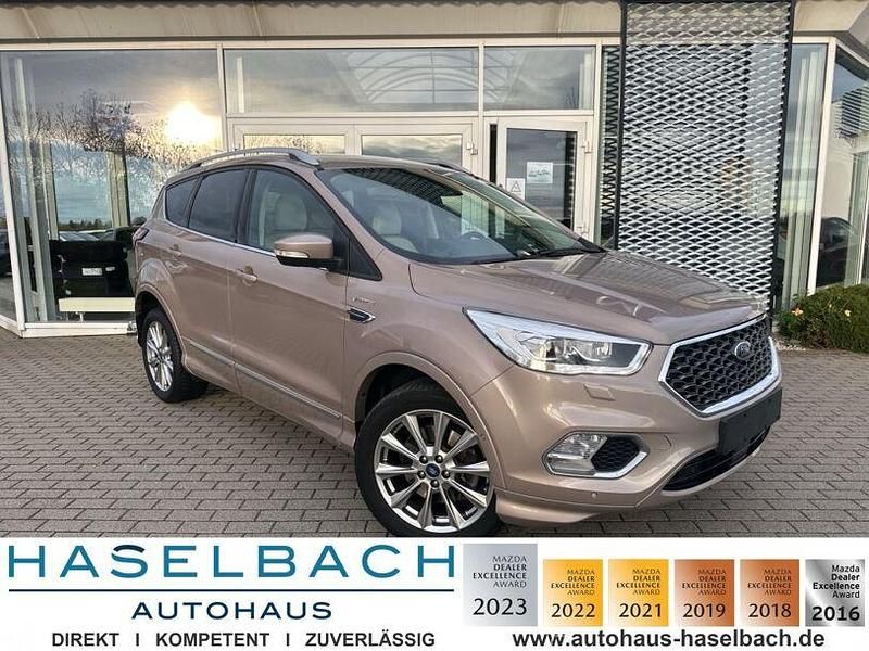 Milano grigio (metallic) Gebraucht 2019 Ford Kuga Vignale SUV | 22.580 € (Fairer Preis) - Bild 1/4