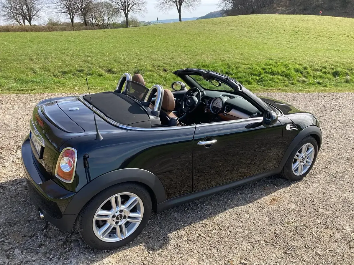 Käytetty Mini Cooper Cabriolet 122 HP (89 kW) 2012 Musta Avoauto