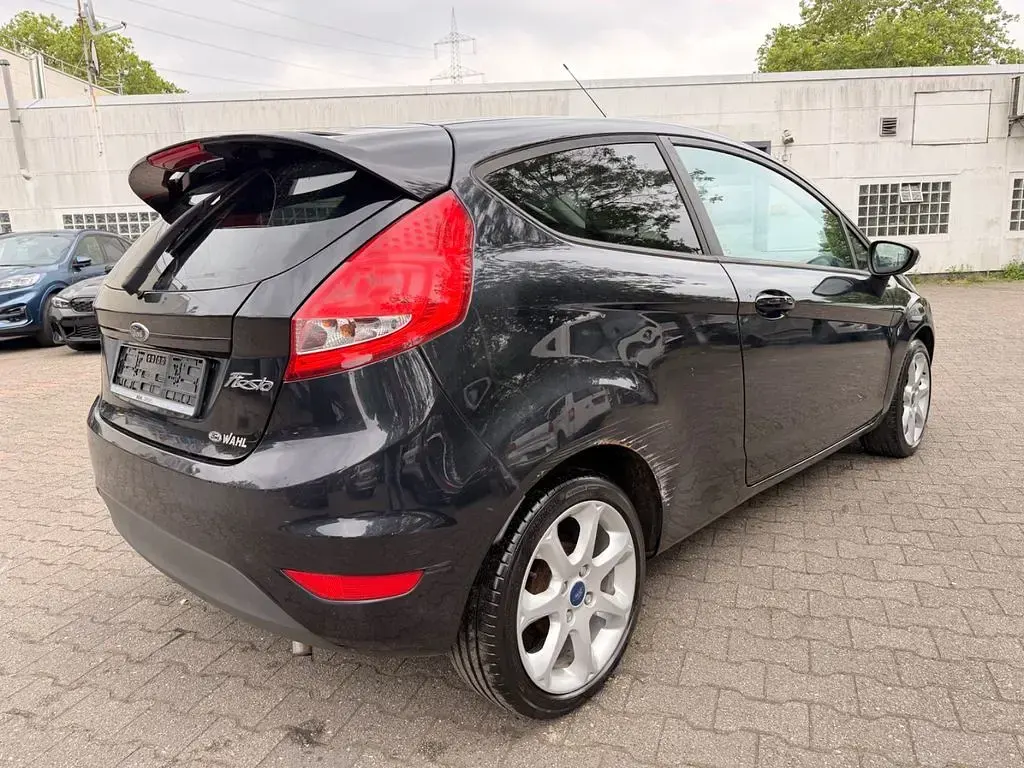 Gebraucht Ford Fiesta Titanium 82 PS (60 kW) 2011 Schwarz Kleinwagen