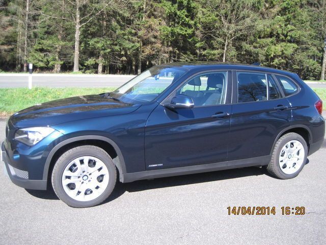 Blau Gebraucht 2013 BMW X1 SUV | 19.500 € - Bild 1/4