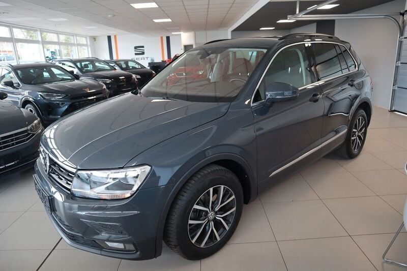 Grau Gebraucht 2020 VW Tiguan R-line SUV | 23.590 € - Bild 1/4