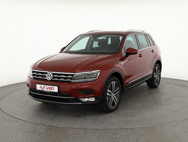 Ruby red metallic (metallic) Gebraucht 2017 VW Tiguan Highline SUV | 27.490 € (Fairer Preis) - Bild 1/4