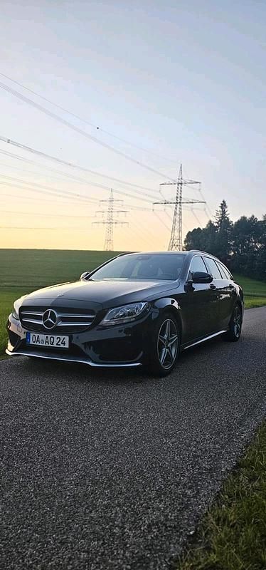 Schwarz Gebraucht 2018 Mercedes C220 AMG line Kombi | 18.500 € - Bild 1/4