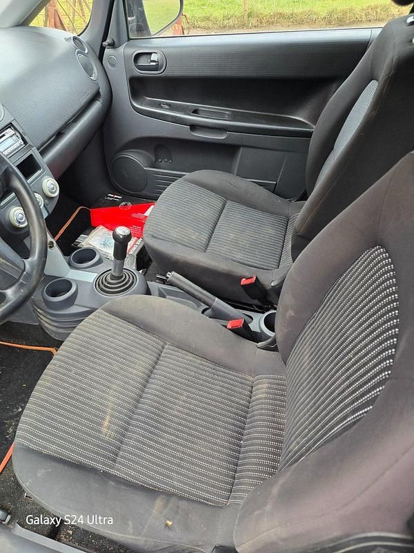 Gebraucht Mitsubishi Colt 75 PS (55 kW) 2004 Rot Kleinwagen