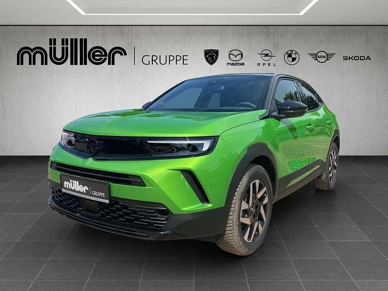 Ikone grün Gebraucht 2024 Opel Mokka SUV | 26.990 € (Teuer) - Bild 1/4