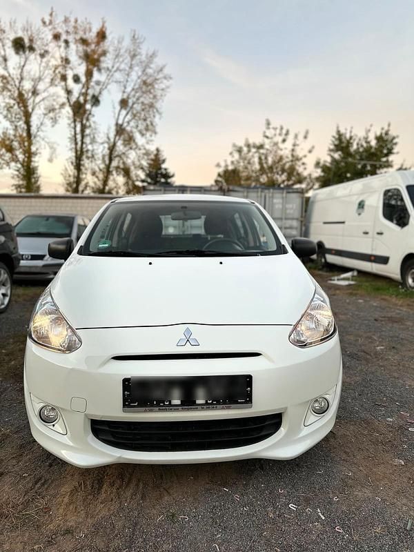 Weiß Gebraucht 2015 Mitsubishi Space Star Kleinwagen | 4.700 € (Guter Preis) - Bild 1/4