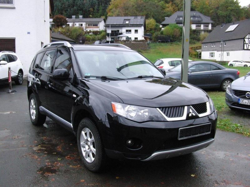 Schwarz Gebraucht 2009 Mitsubishi Outlander SUV | 4.390 € (Fairer Preis) - Bild 1/4