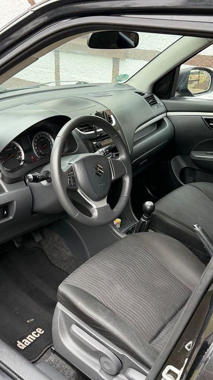 Second-hand Suzuki Swift 94 CP (69 kW) 2012 Negru Hatchback